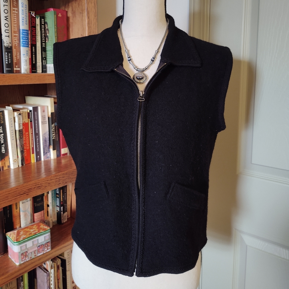 Black 100 percent boiled wool sweater vest.